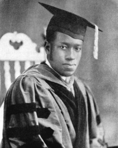 Cox in academic regalia.